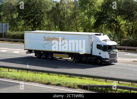 Sainsbury`s articulated lorry on the M40 motorway, Warwickshire, UK Stock Photo